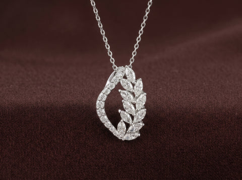 Asymmetrical Laurel Leaf Moissanite Pendant in Sterling Silver
