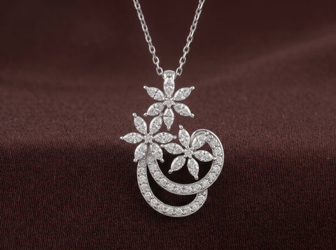 Floral Cascade & Ribbon Swirl Moissanite Pendant in Sterling Silver